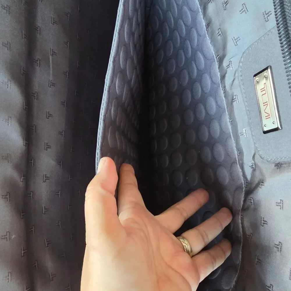 Tumi black leather briefcase